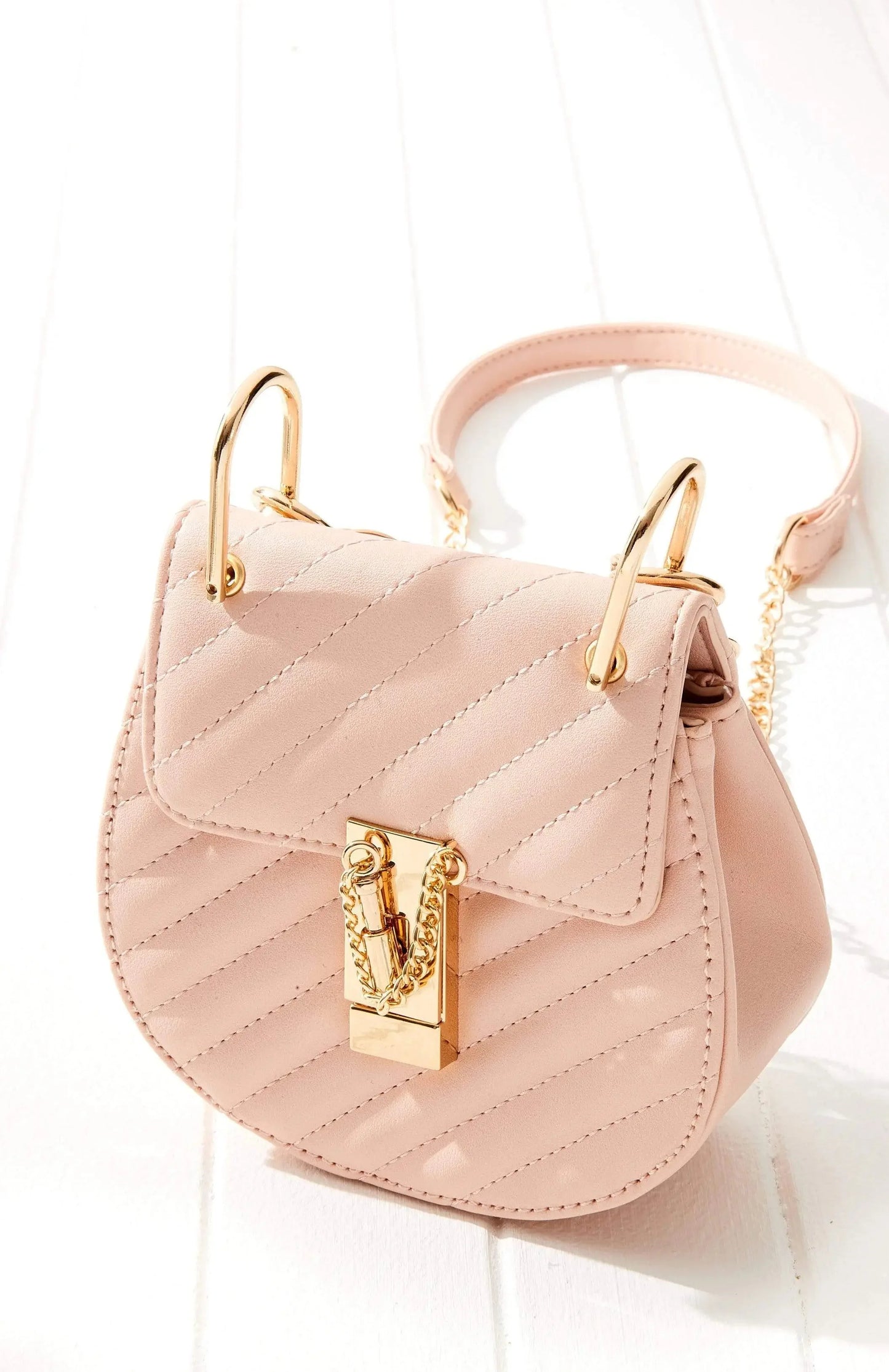 Vegan Leather Tanami Quilted Saddle Bag (PINK)