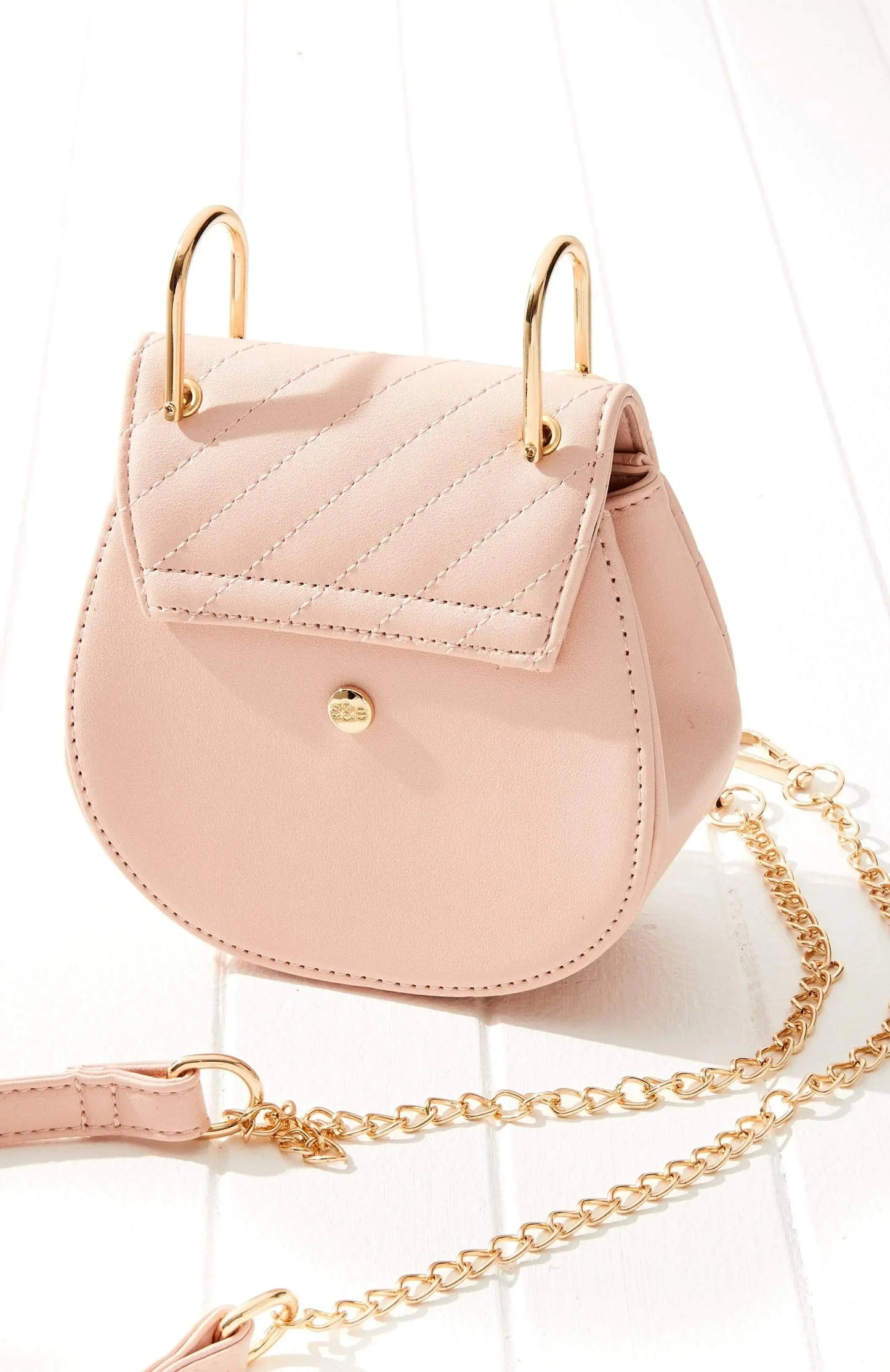 Vegan Leather Tanami Quilted Saddle Bag (PINK)